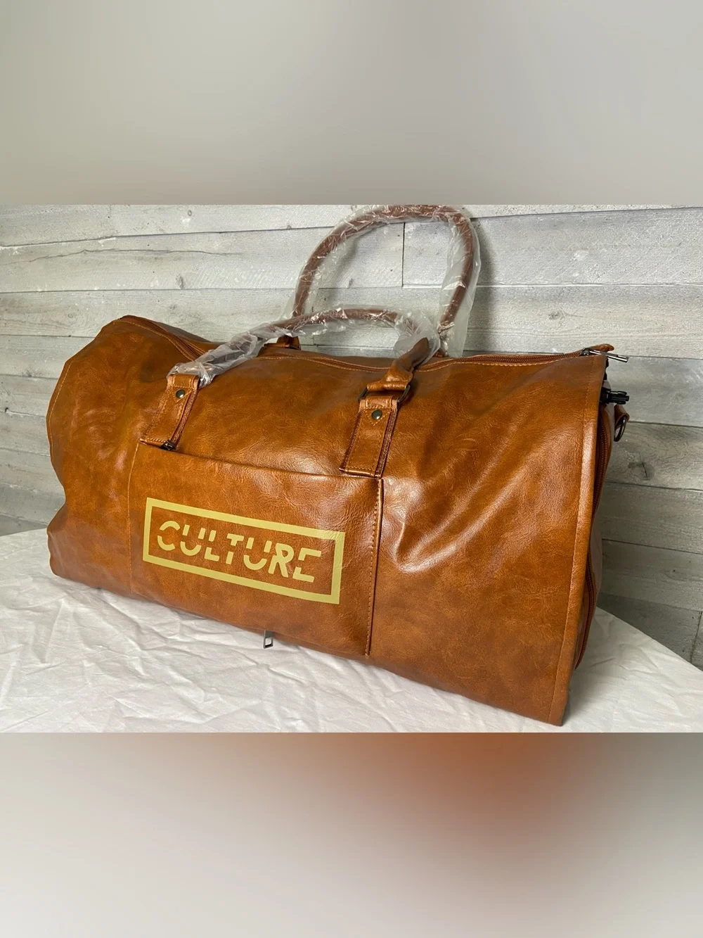 Culture Kicks tan duffel